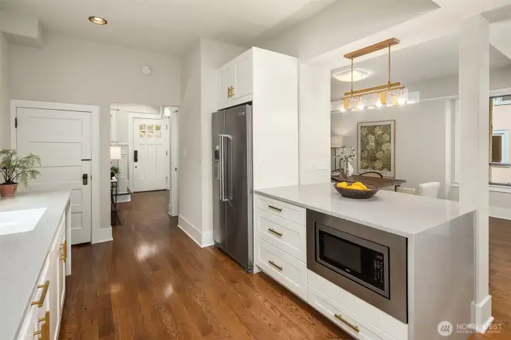 Looking back to the front door - the door on the left leads downstairs