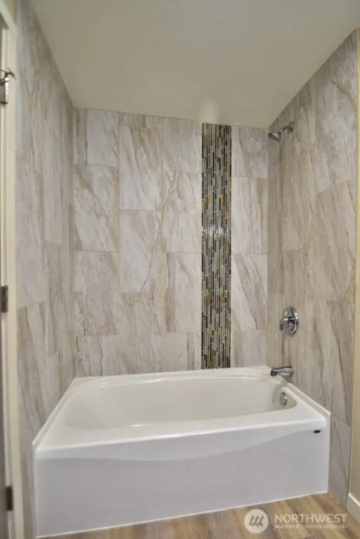 Beautifully updated bathtub in the hall bathroom