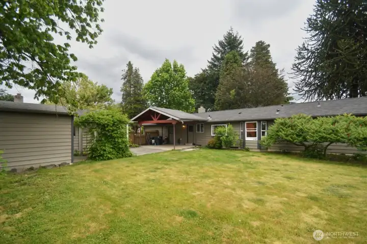 View of the back of the house from the backyard  at the corner of the lot.
