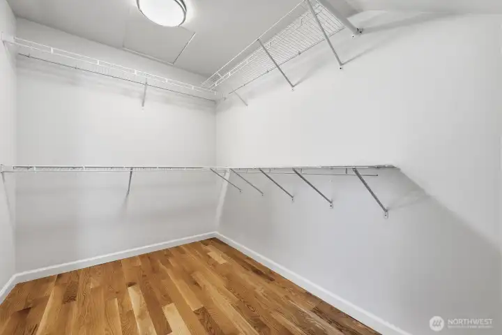 Large walk-in closet with additional storage room attached