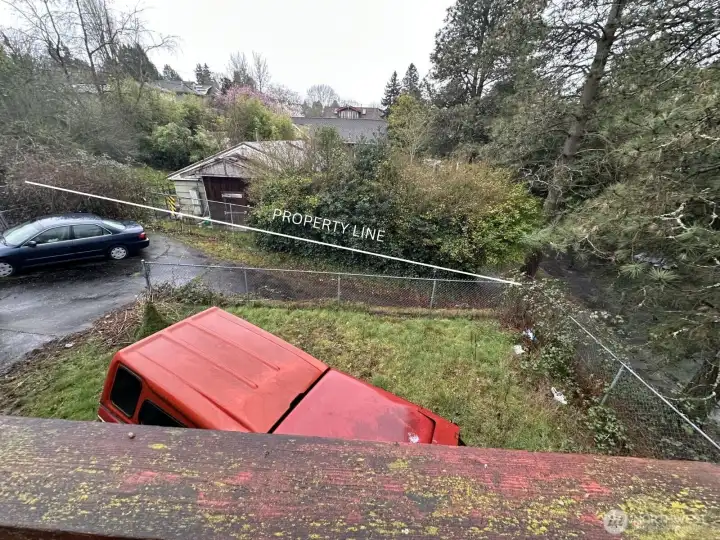 Rear Driveway goes down to the alley to the right.