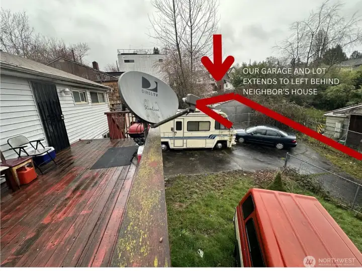 Our property extends to the left behind the neighbors house.  The owner has a secured garage in this area.