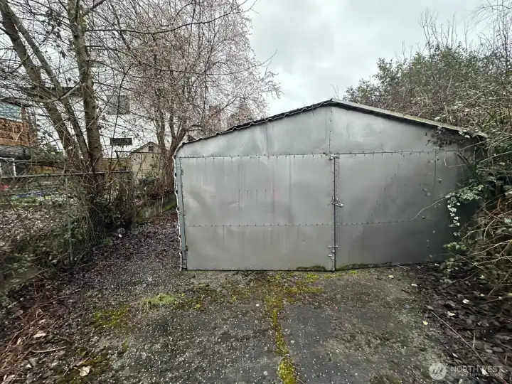 Garage on "extended lot" purchased from neighbors.  All part of our lot, now.
