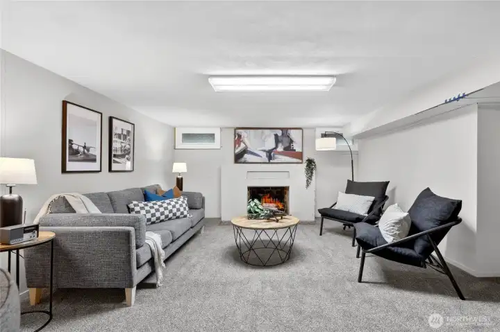 Downstairs is a large flex area with a fireplace. Game room, exercise space, office?? Possibilities are endless.