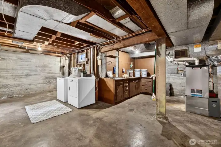 Basement is partially unfinished giving your buyer plenty of flexibility on how to utilize the space. There is a newer water line, gas furnace, gas tankless water heater, and plumbing. The non conforming room is just to the left in this photo for reference.
