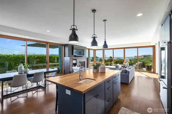 Floor-to-ceiling, south-facing fir windows and  sliding doors