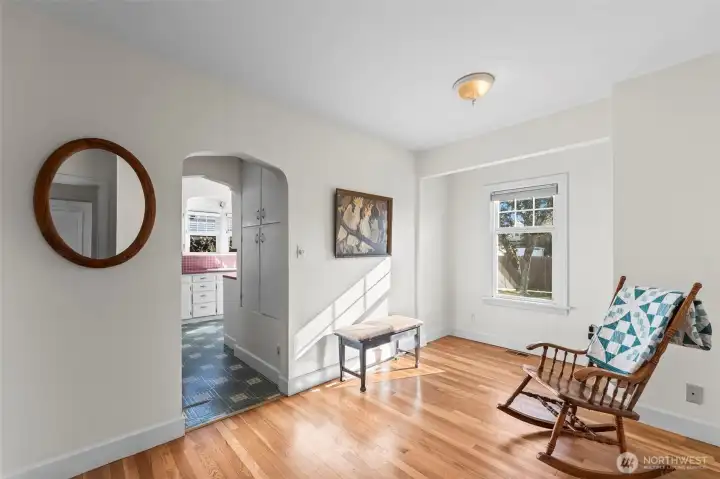 Versatile Office/Den: This bright main-floor room features warm hardwood floors and a coved entryway. It serves perfectly as a quiet home office, library, or hobby room.