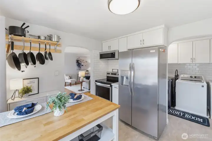 Kitchen workspace with additional prep area and storage, ideal for everyday functionality.