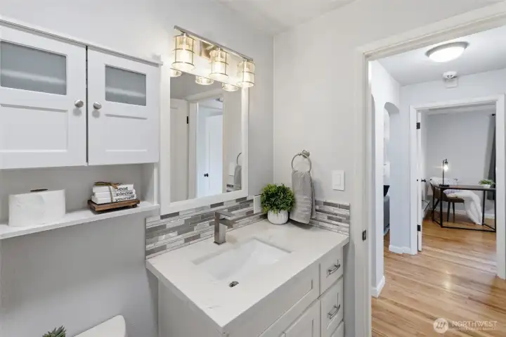 Additional bathroom angle highlighting updated finishes and clean design.