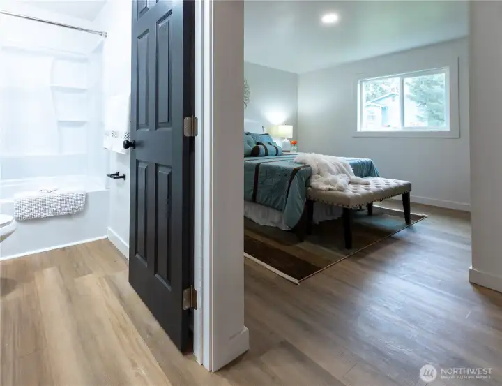 Primary bedroom with ensuite bath is separate from the rest of the home!