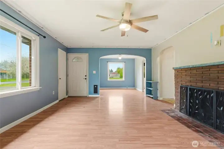 Entry door flows into the living and dining rooms