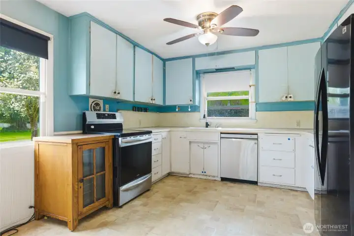 This spacious kitchen is ready for an awesome upgrade.
