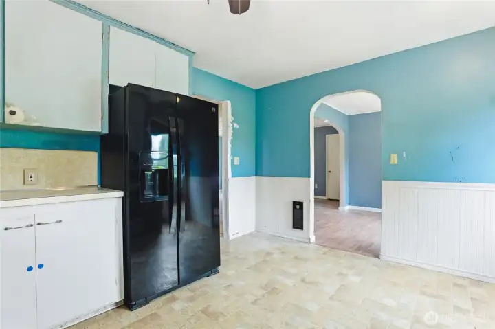 Kitchen looking into dining and living rooms
