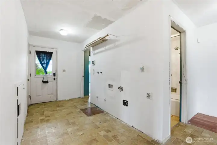 Hallway with washer/dryer access