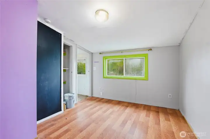 Utilized as a large closet which could easily be turned back into a bedroom
