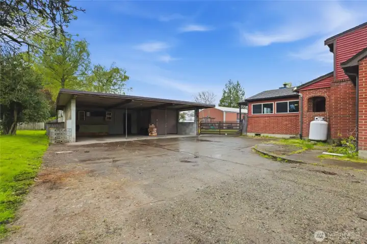 This oversized carport has a lot of room for various projects!