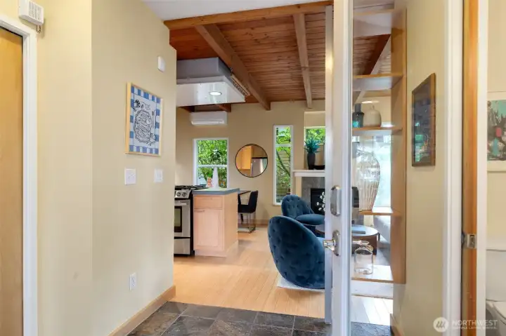 Enter on the main level with a coat closet and plenty of storage for the vacuum, broom, shoes, you name it!