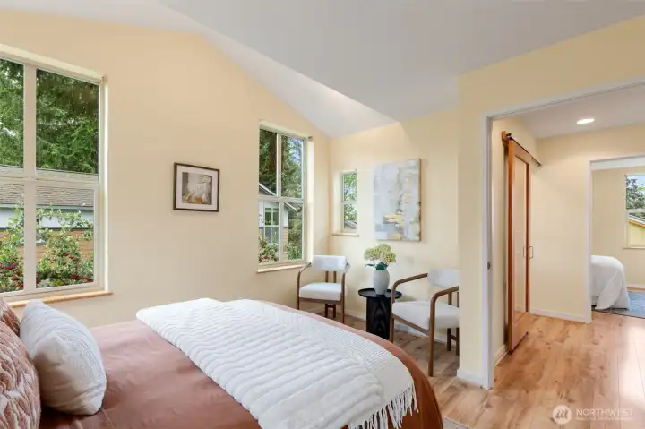Primary bedroom even has space for a seating nook or add a dresser with entertainment.