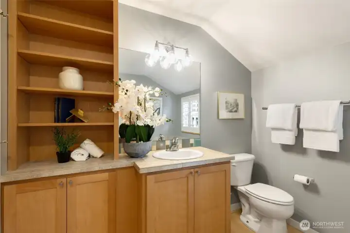 Upstairs bathroom with an abundance of storage for everyone in the house.
