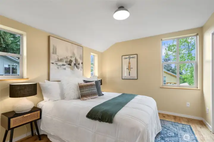 All windows throughout the house have custom blinds. The first floor has plantation shutters and roman blinds. Upstairs is outfitted with wood blinds to blend with the nature outside the windows.