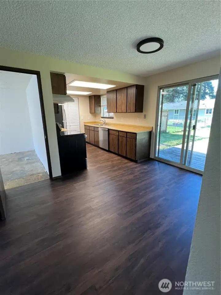 1523 Kitchen, Dining, Garage Entry, Slider to Back Deck & Yard