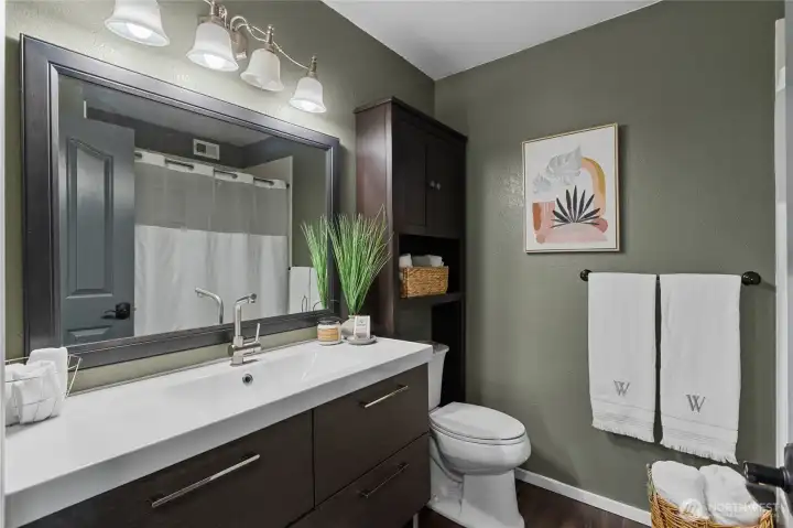 Updated main bath, modern vanity, new tile bath.