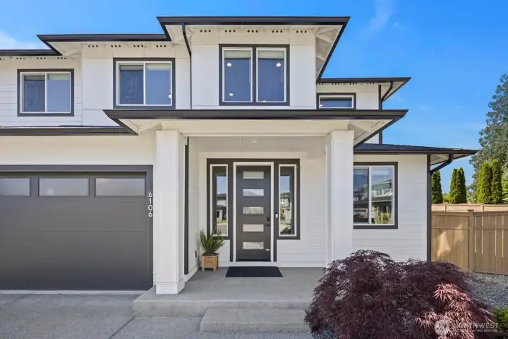 A covered front entry and modern architectural lines give this home a welcoming first impression, while thoughtful upgrades throughout help this 2024 build feel polished, complete, and move-in ready from day one. A covered front entry and modern architectural lines give this home a welcoming first impression, while thoughtful upgrades throughout help this 2024 build feel polished, complete, and move-in ready from day one.