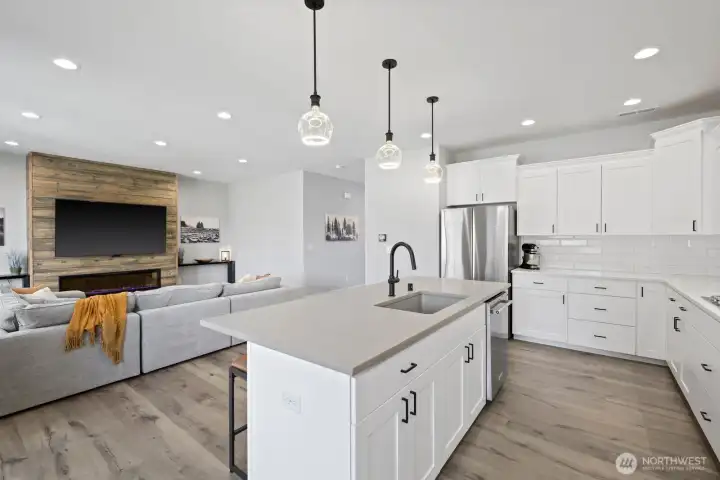 The open layout keeps the kitchen connected to the great room, creating a space that feels welcoming, functional, and easy to live in whether hosting friends or settling into a quiet night at home. The open layout keeps the kitchen connected to the great room, creating a space that feels welcoming, functional, and easy to live in whether hosting friends or settling into a quiet night at home.