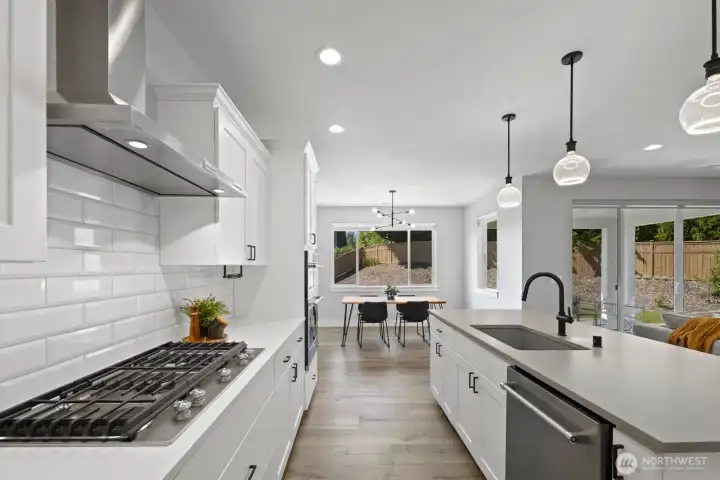 From the oversized island to the walk-in pantry and adjacent dining area, this kitchen was designed to support real daily living while still feeling polished and elevated. From the oversized island to the walk-in pantry and adjacent dining area, this kitchen was designed to support real daily living while still feeling polished and elevated.