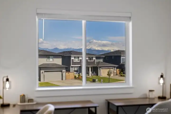 Mount Rainier views from the upper level add a Pacific Northwest backdrop that makes everyday moments at home feel a little more special. Mount Rainier views from the upper level add a Pacific Northwest backdrop that makes everyday moments at home feel a little more special.