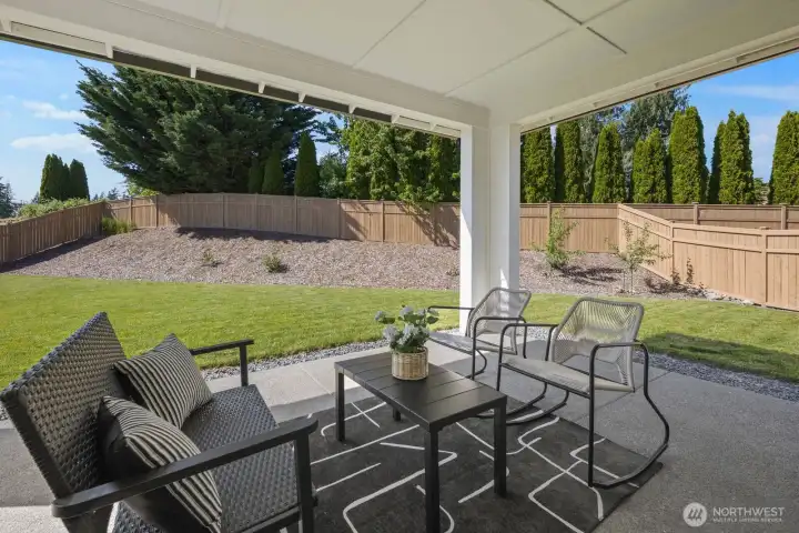 The covered back patio creates an easy extension of the living space, offering a comfortable spot for outdoor dining, quiet mornings, or relaxing evenings year-round. The covered back patio creates an easy extension of the living space, offering a comfortable spot for outdoor dining, quiet mornings, or relaxing evenings year-round.