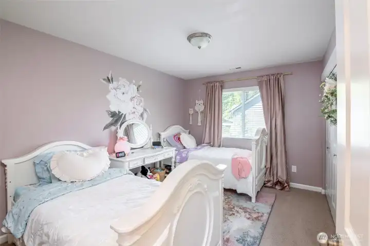 Double closets in this large bedroom.