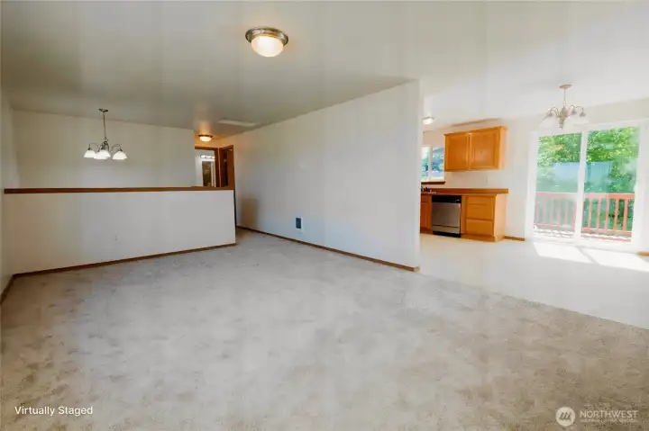 Looking from living room, down the hall to the 2 upstairs bedrooms and bathroom.