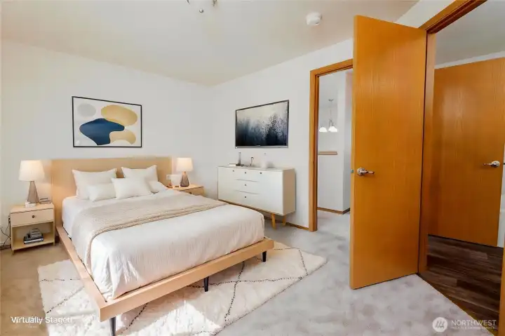 Virtually Staged Primary bedroom with continental full bathroom.
