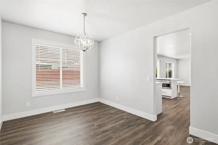 Formal dining room off of kitchen.