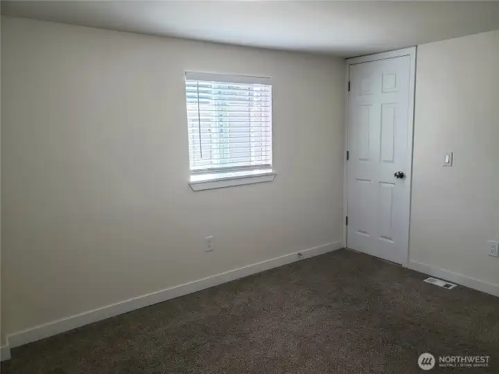 Another Picture of theSpacious Primary Bedroom with New Paint, Trim, Blinds and Carpeting. Another Picture of theSpacious Primary Bedroom with New Paint, Trim, Blinds and Carpeting.