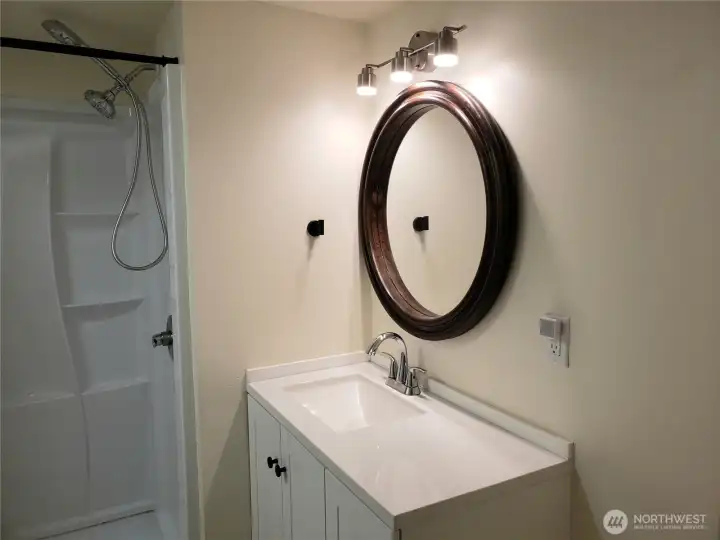 Brand New Bathroom with New Shower, Sink, Faucet, Toilet and Counter Top. Brand New Bathroom with New Shower, Sink, Faucet, Toilet and Counter Top.