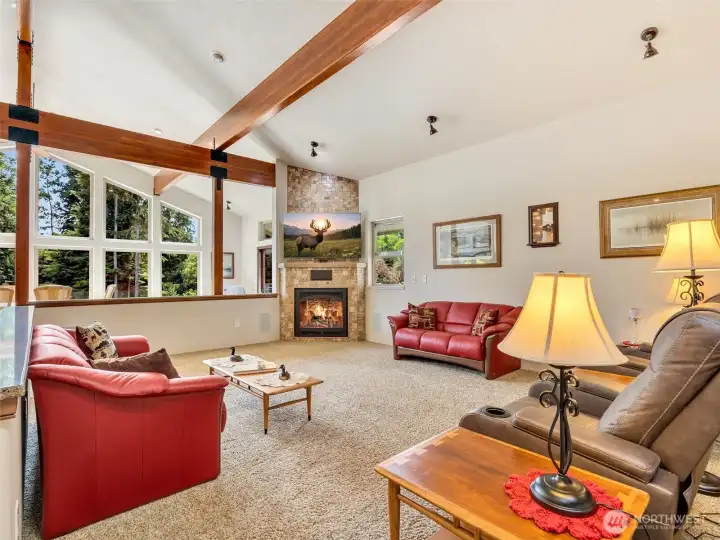 Gather around the fireplace in this inviting living room designed for comfort and conversation. Gather around the fireplace in this inviting living room designed for comfort and conversation.