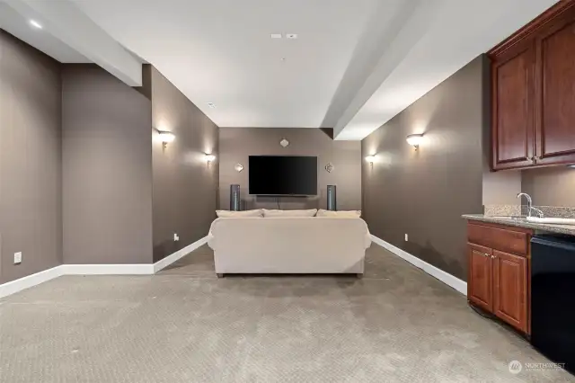 Theater Room. Wet bar, refrigerator are on the right in this photo.  Media equipment included.