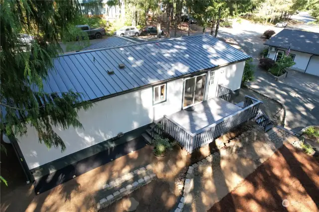 Arial view of deck w/ metal roof installed in 2018