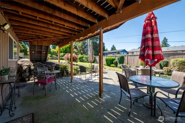 Covered patio with so much room for seating.