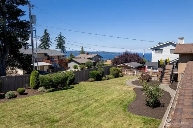 Well manicured fenced backyard