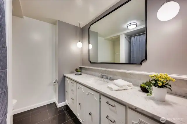 Lovely tile guest bath.