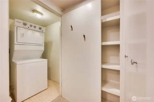 Off the den office space is the laundry conveniently tucked away.
