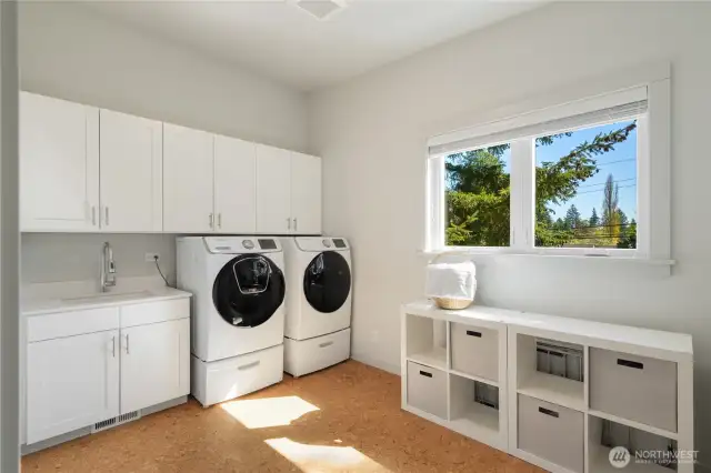 upstairs spacious laundry room!