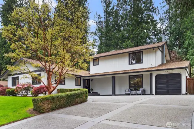 Framed by mature trees and vibrant landscaping, this Rose Hill home offers the perfect blend of charm, comfort, and curb appeal.