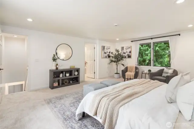 Large windows bring in natural light while maintaining privacy, creating a peaceful escape.