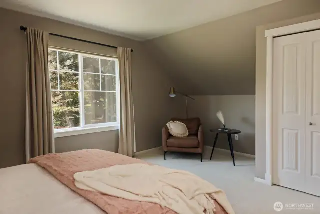 There's even a nook for a desk or sitting area and a standard sized closet, too!
