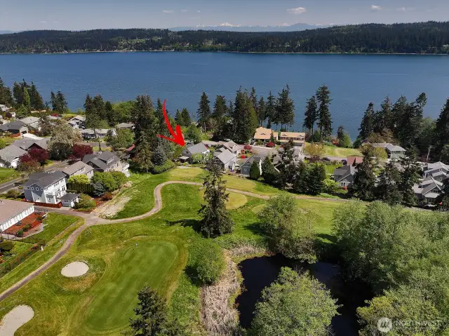 Welcome to Holmes Harbor with the Cascades in the distance. You don't have to golf to enjoy living alongside the 18th Fairway of Holmes Harbor Golf Club (www.holmesharborgolfcourse.com). You are also close to Freeland amenities.