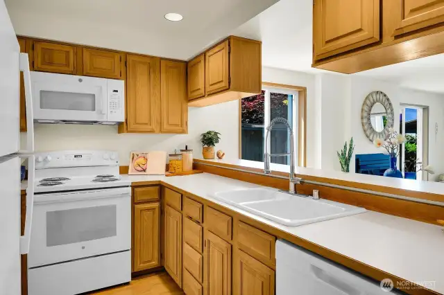 New appliances and fixtures make this cozy kitchen light and bright!